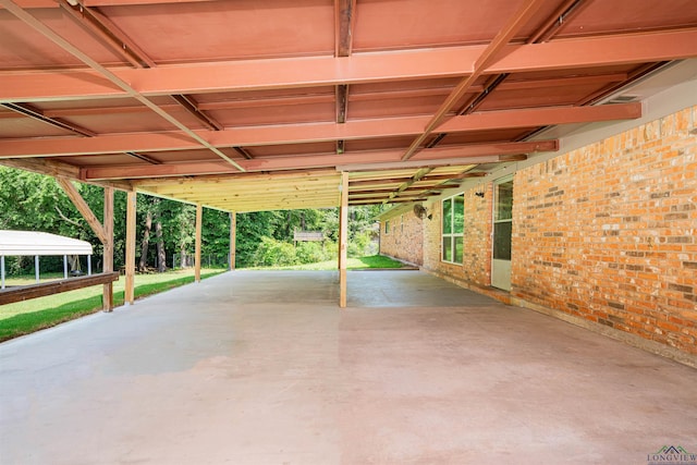 4525 Surratt Rd, Longview, TX 75604 - view of patio featuring a carport