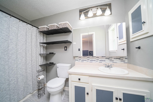 4525 Surratt Rd, Longview, TX 75604 - bathroom featuring toilet, vanity, tasteful backsplash, and a textured ceiling