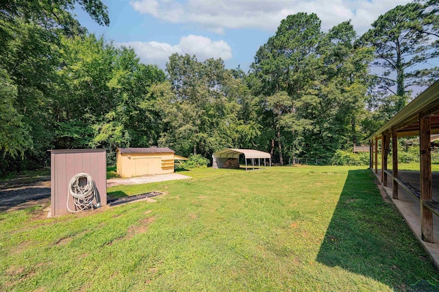 4525 Surratt Rd, Longview, TX 75604 - view of green lawn featuring a carport