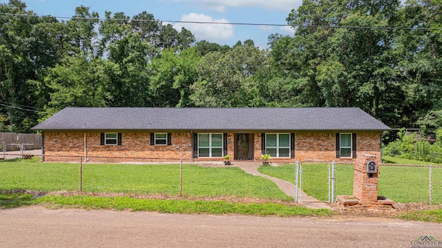 4525 Surratt Rd, Longview, TX 75604 - ranch-style home featuring brick siding, a gate, and a shingled roof