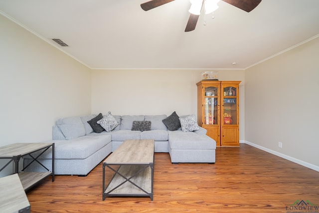 105 Sherwood Dr, Longview, TX 75605 - living area with crown molding, visible vents, a ceiling fan, and wood finished floors