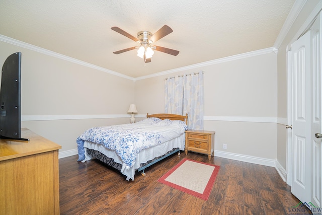 105 Sherwood Dr, Longview, TX 75605 - bedroom with ornamental molding, baseboards, a textured ceiling, dark wood finished floors, and ceiling fan