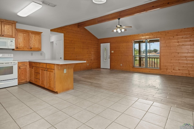 kitchen featuring white appliances, kitchen peninsula, wooden walls, ceiling fan, and vaulted ceiling with beams