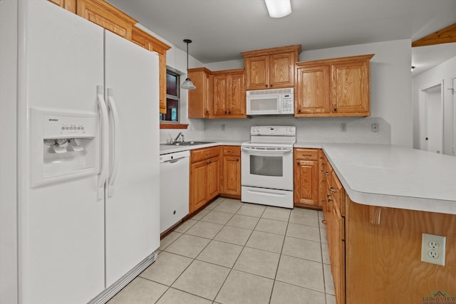 kitchen featuring sink, white appliances, light tile patterned flooring, kitchen peninsula, and pendant lighting