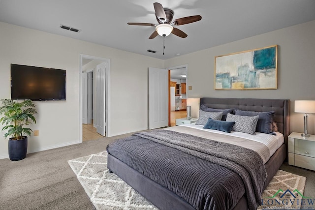 carpeted bedroom with ceiling fan