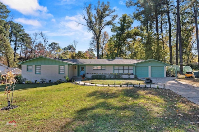 ranch-style home with a front yard and a garage