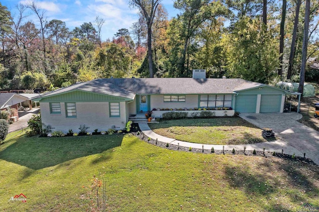 ranch-style house with a front yard and a garage