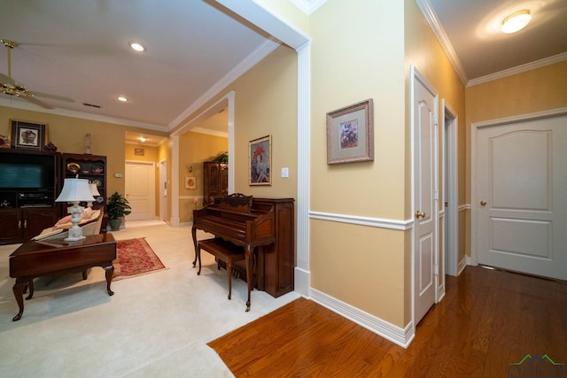 7 Casey Ct, Longview, TX 75604 - hall with ornamental molding, wood finished floors, and recessed lighting