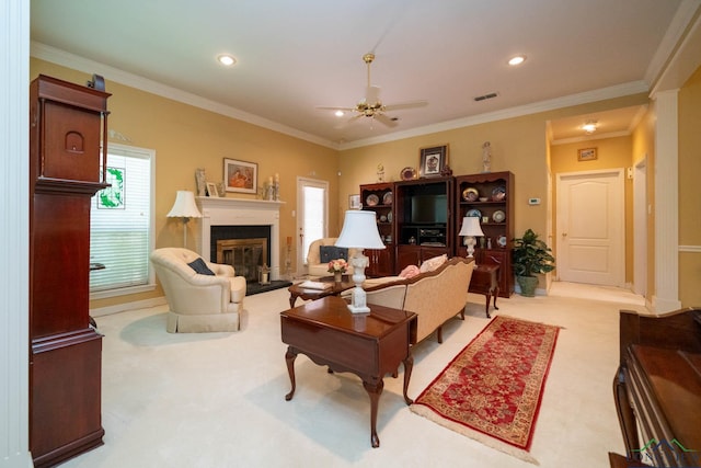7 Casey Ct, Longview, TX 75604 - carpeted living room featuring a ceiling fan, a glass covered fireplace, ornamental molding, and recessed lighting