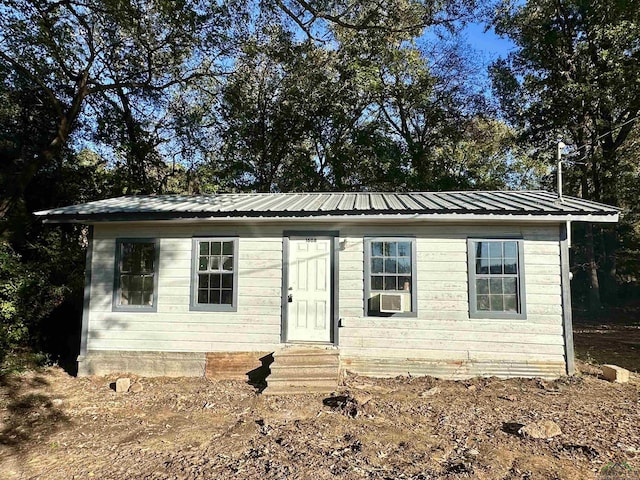 view of front facade featuring cooling unit