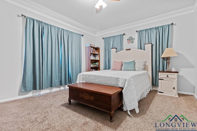 bedroom featuring baseboards, a ceiling fan, and light colored carpet