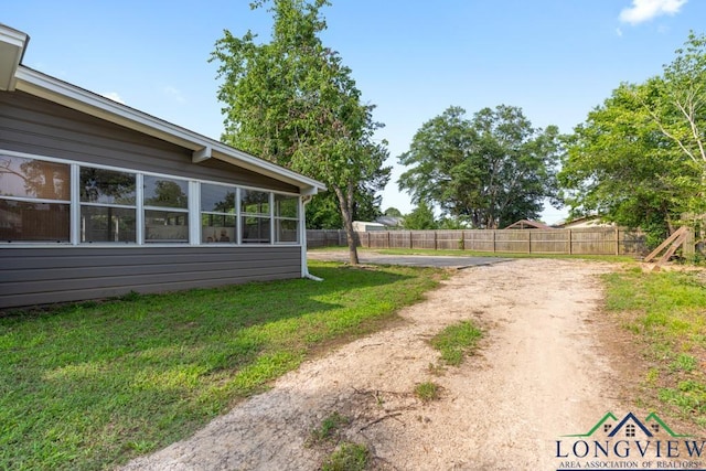 view of yard featuring fence