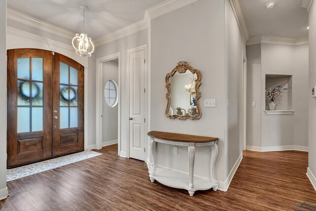 475 Highland Pl, Hallsville, TX 75650 - entryway featuring a notable chandelier, french doors, baseboards, crown molding, and wood finished floors
