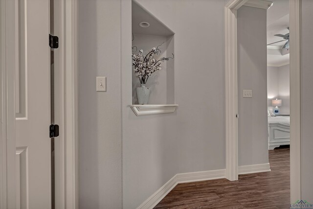 475 Highland Pl, Hallsville, TX 75650 - hall with baseboards, ornamental molding, and dark wood-style floors