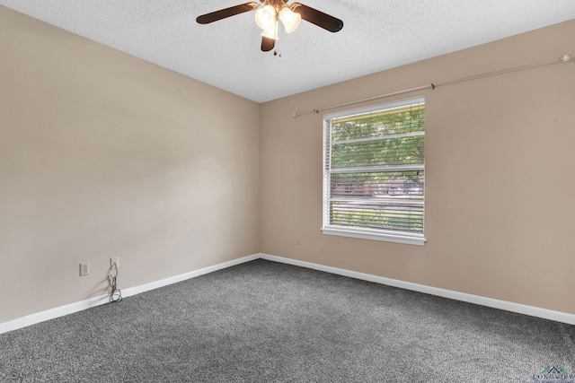 105 Bison Trl, Longview, TX 75601 - unfurnished room with carpet floors, ceiling fan, baseboards, and a textured ceiling