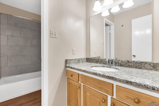 105 Bison Trl, Longview, TX 75601 - full bath featuring wood finished floors, vanity, and baseboards