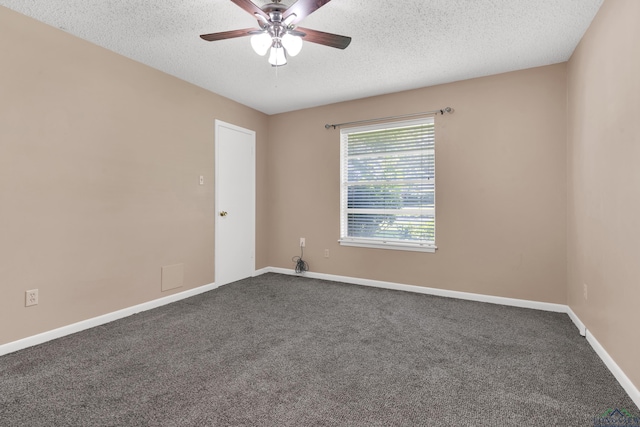 105 Bison Trl, Longview, TX 75601 - empty room with a textured ceiling, ceiling fan, dark carpet, and baseboards