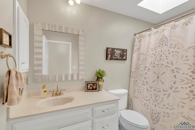 602 Pierce St, Lindale, TX 75771 - bathroom with a skylight, toilet, and vanity