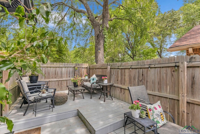 602 Pierce St, Lindale, TX 75771 - wooden terrace featuring a fenced backyard