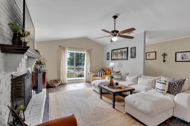 602 Pierce St, Lindale, TX 75771 - living room with hardwood / wood-style floors, ceiling fan, lofted ceiling, and a fireplace