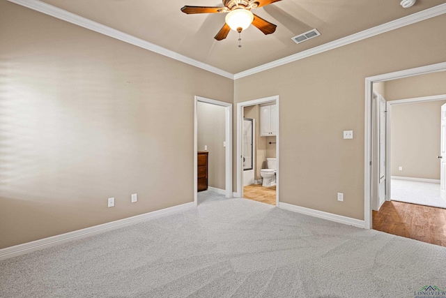 unfurnished bedroom with light carpet, connected bathroom, ceiling fan, and ornamental molding