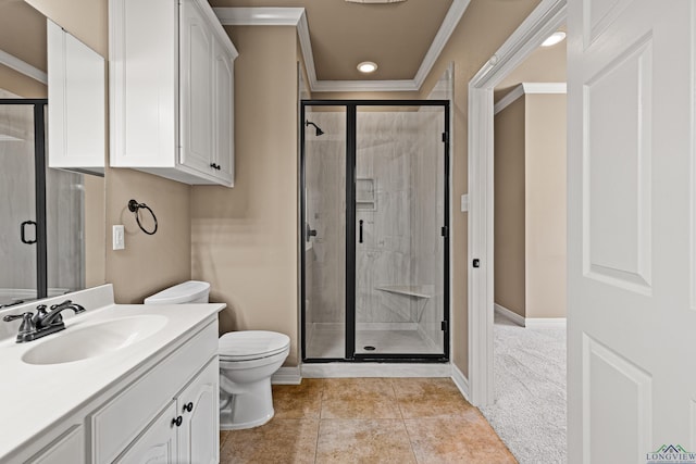 bathroom with tile patterned floors, an enclosed shower, vanity, crown molding, and toilet