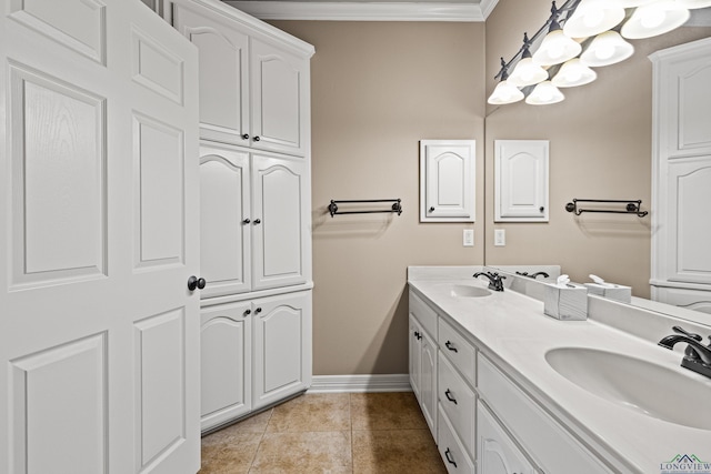 bathroom featuring tile patterned floors, vanity, and crown molding