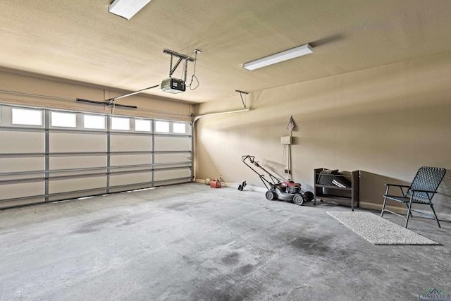 garage featuring a garage door opener