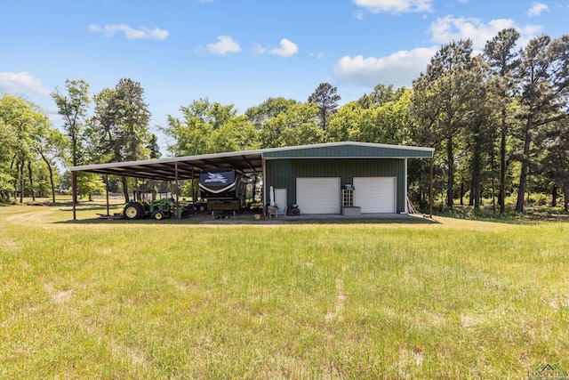 1767 County Road 3840, Hawkins, TX 75765 - view of property's community with a detached garage, an outdoor structure, and a lawn