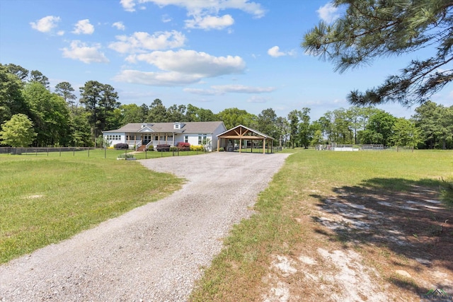 1767 County Road 3840, Hawkins, TX 75765 - view of front of home featuring driveway, a detached carport, and a gazebo