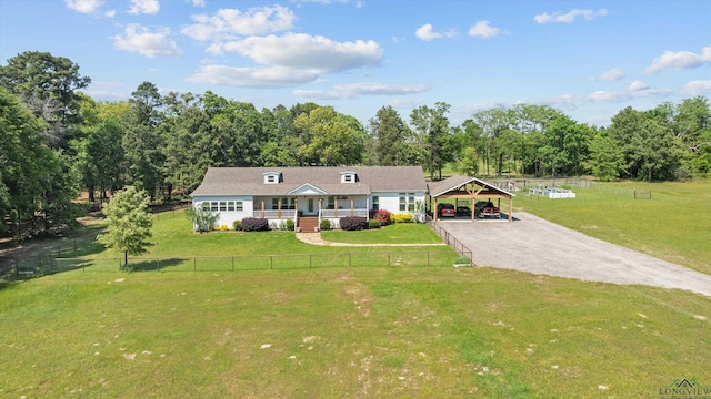 1767 County Road 3840, Hawkins, TX 75765 - view of front of home with a porch, gravel driveway, a detached carport, and view of scattered trees
