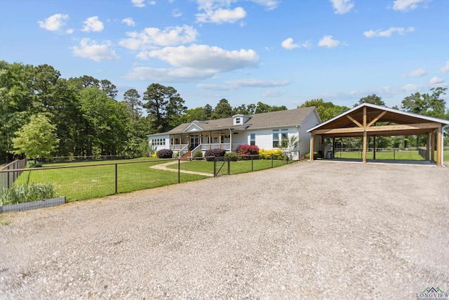 1767 County Road 3840, Hawkins, TX 75765 - single story home with a porch, driveway, and a detached carport