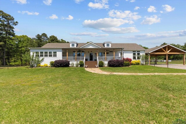 1767 County Road 3840, Hawkins, TX 75765 - view of front of property featuring a porch, a detached carport, a front yard, and a gazebo