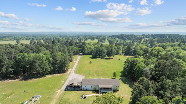 1767 County Road 3840, Hawkins, TX 75765 - aerial view of property and surrounding area featuring a heavily wooded area