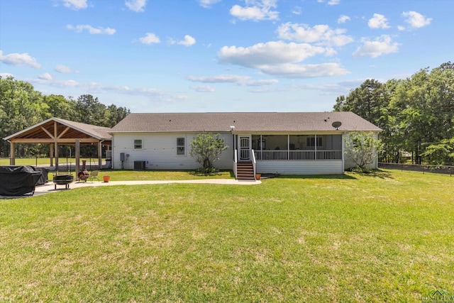 1767 County Road 3840, Hawkins, TX 75765 - rear view of property with a gazebo, crawl space, a lawn, and central AC
