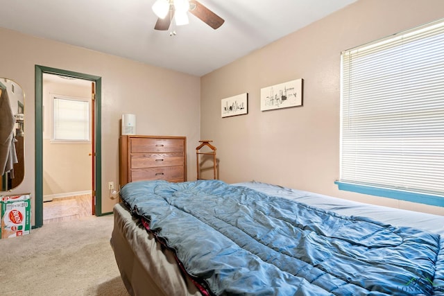 bedroom with carpet flooring, ceiling fan, and baseboards