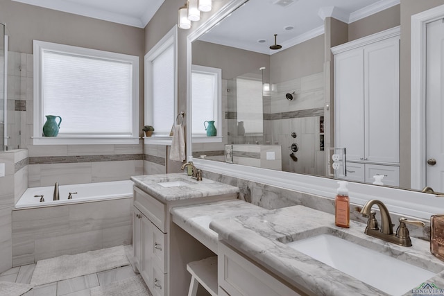 bathroom with vanity, ornamental molding, and shower with separate bathtub