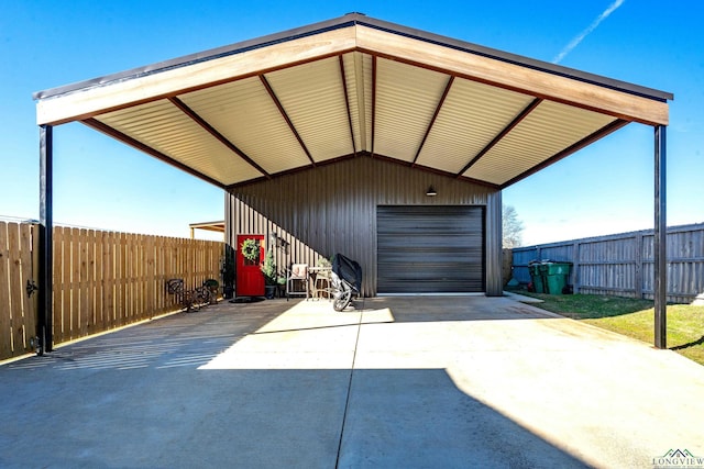 garage featuring a carport