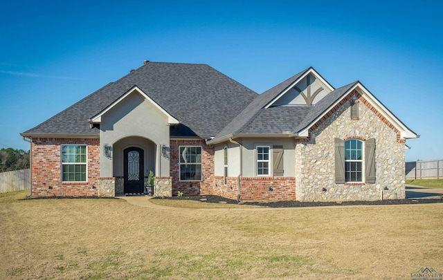 view of front of house with a front lawn