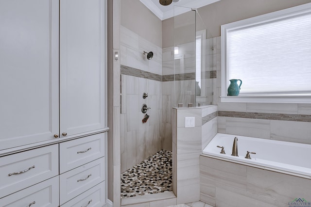 bathroom with shower with separate bathtub