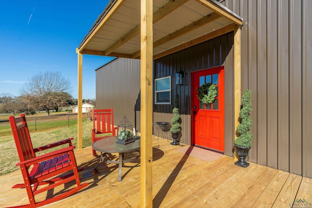 doorway to property with a wooden deck