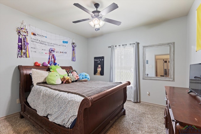 bedroom with carpet, a ceiling fan, and baseboards