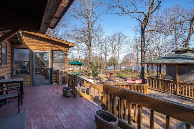 deck with a sunroom