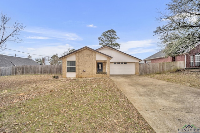 single story home featuring a garage