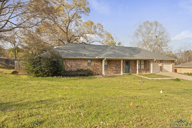 ranch-style house with a garage and a front lawn