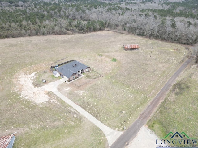 birds eye view of property featuring a rural view