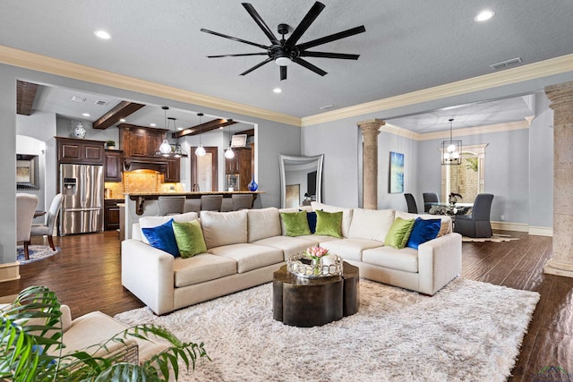 1600 Olympic Dr, Longview, TX 75605 - living room featuring ornate columns, dark wood-type flooring, ceiling fan, baseboards, and recessed lighting