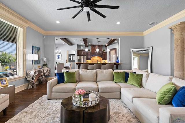 1600 Olympic Dr, Longview, TX 75605 - living area with ceiling fan, dark wood-type flooring, a textured ceiling, ornamental molding, and baseboards