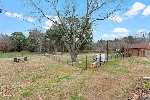 view of yard with a rural view