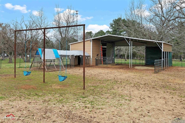 view of playground featuring an outdoor structure